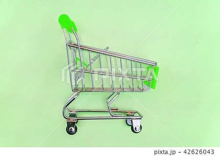 Toy cart on pastel green background 42626043