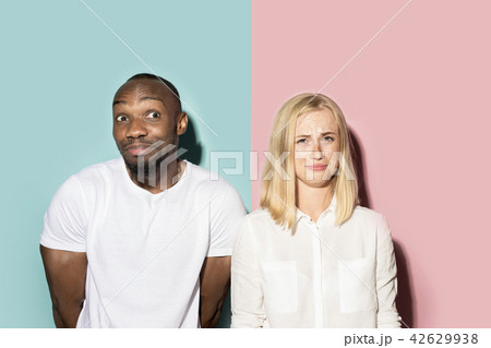 Man and woman posing at studio during quarrel Man and woman posing at studio during quarrel 42629938