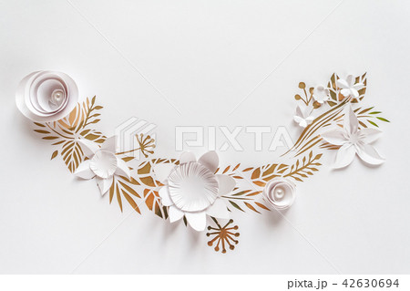 Semicircle frame with white paper flowers Semicircle frame with white paper flowers 42630694