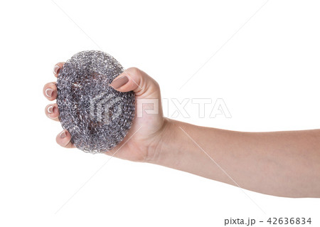 metal sponge for utensils in a female hand metal sponge for utensils in a female hand 42636834