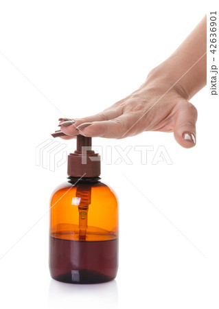 bottle with liquid soap in hand 42636901