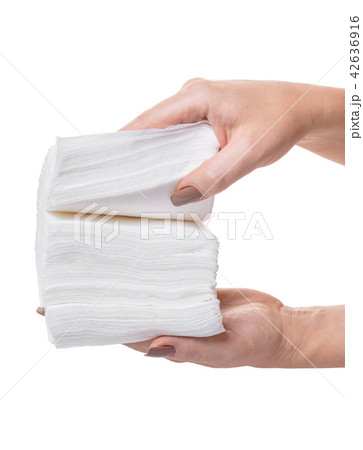 pack of napkins in hands pack of napkins in hands 42636916