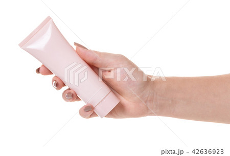 Female hand with a tube of cosmetic cream Female hand with a tube of cosmetic cream 42636923