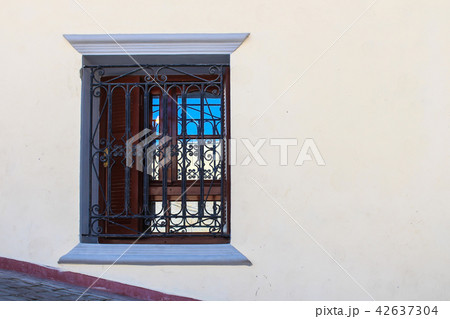 Historical window with a reflection 42637304