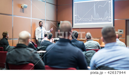 Skiled Public Speaker Giving a Talk at Business Meeting. Skiled Public Speaker Giving a Talk at Business Meeting. 42637944