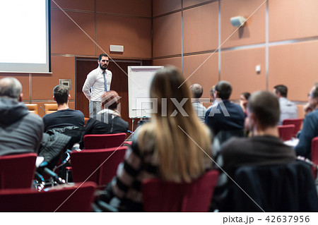 Skiled Public Speaker Giving a Talk at Business Meeting. 42637956