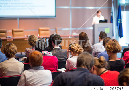 Business speaker giving a talk at business conference event. Business speaker giving a talk at business conference event. 42637974