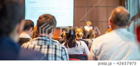 Woman giving presentation on business conference. 42637975