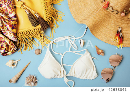 diverse travel girlish stuff on colorful background blue and yel diverse travel girlish stuff on colorful background blue and yel 42638041