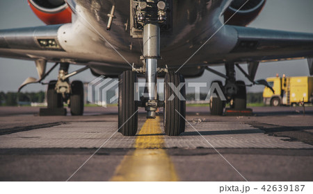 jet's front nose landing gear at the airport 42639187