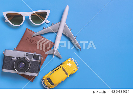 Summer travel with plane camera passport car 42643934
