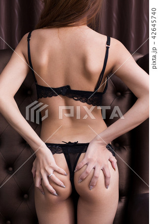 sexy young woman model in sexy black lingerie sexy young woman model in sexy black lingerie 42645740