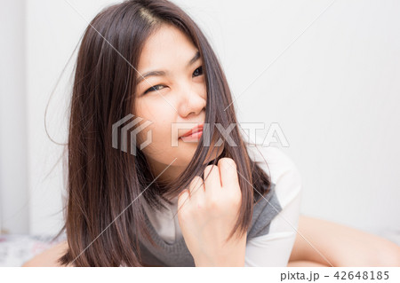 Smiling fashion asian beautiful women feel happy 42648185
