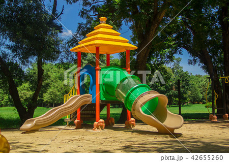 colourful children playground equipment 42655260