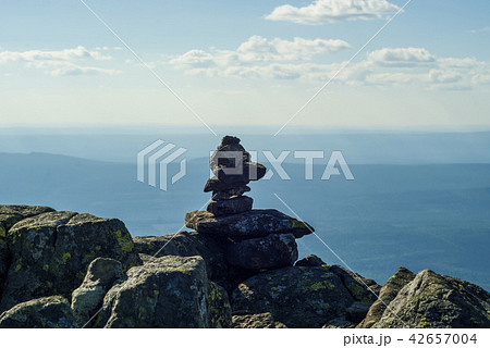 stone idol on a mountain plateau 42657004