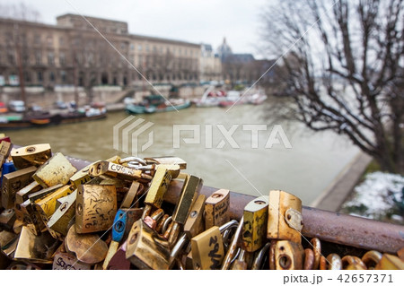 Love locks at Pont Neuf and the city of Paris 42657371