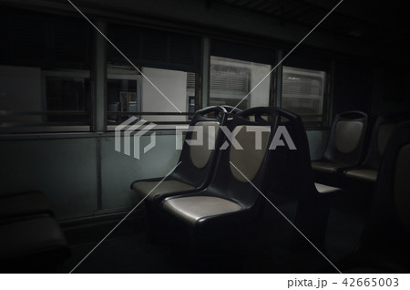 Seat interior in empty cabin of old diesel train 42665003