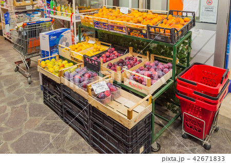 Display of fruits with apricots, apples and plum Display of fruits with apricots, apples and plum 42671833