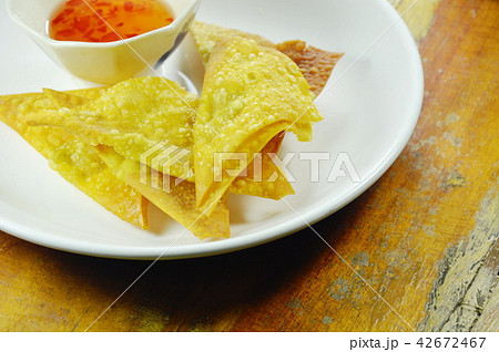 crispy fried dumpling paste dipping sweet sauce 42672467