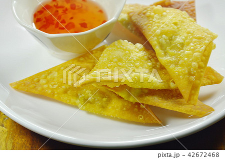 crispy fried dumpling paste dipping sweet sauce 42672468