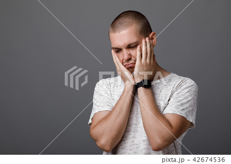 Portrait of frustrated young man 42674536