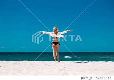 woman on sea beach 42680452