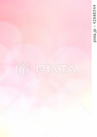 ピンク系の玉ボケ キラキラ 背景素材の写真素材