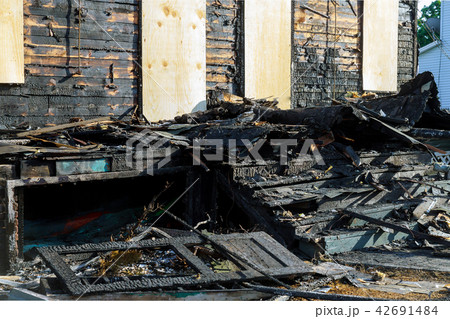 Abandoned house completely consumed by fire Abandoned house completely consumed by fire 42691484