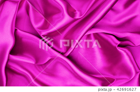 Closeup of rippled purple silk fabric Closeup of rippled purple silk fabric 42691627