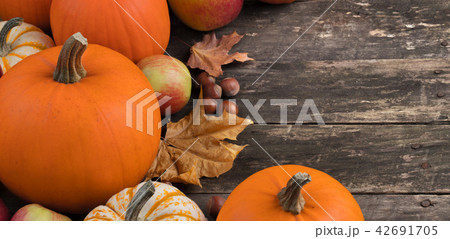 Autumn harvest on wooden table Autumn harvest on wooden table 42691705