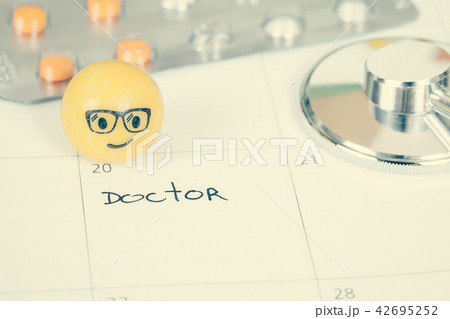 The words Doctor written on a Calendar to Remind 42695252