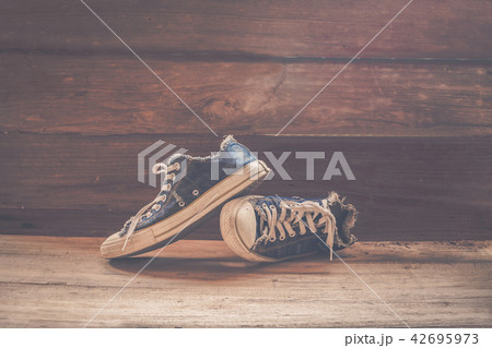 still life old shoes on wood 42695973