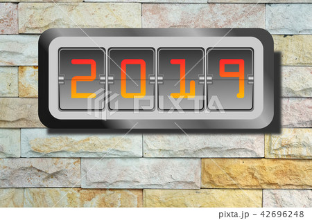 Digit Year clock on rock wall background. 42696248