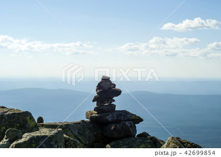 stone idol on a mountain plateau stone idol on a mountain plateau 42699854