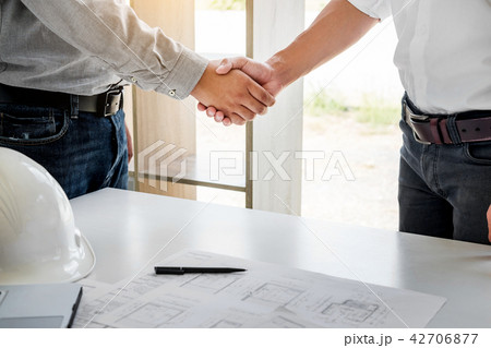 architecture and home renovation concept - builder with blueprin 42706877
