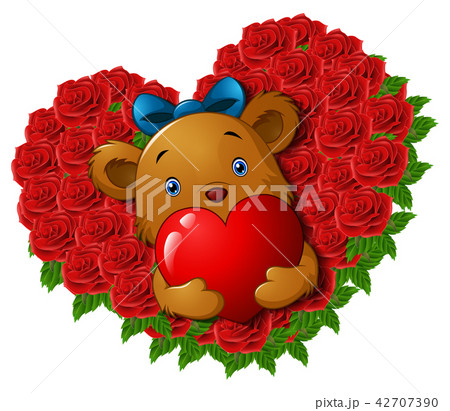 Cute teddy bear holding red heart in roses flower  42707390