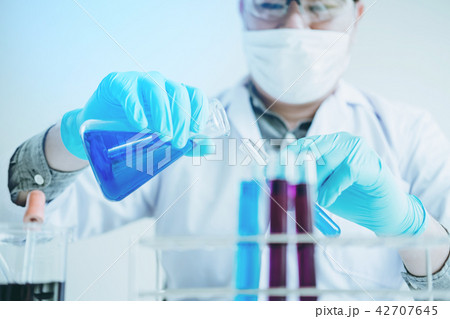 Scientist with equipment holding tools during Scientist with equipment holding tools during 42707645