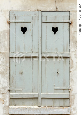 closed wooden shutters closed wooden shutters 42710182
