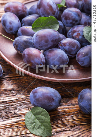 plums on the table 42710210