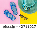Beach accessories on table 42711027