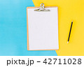 Wooden clipboard on table 42711028