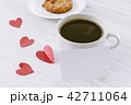 Heart and coffee on a wooden background 42711064