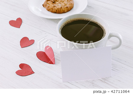 Heart and coffee on a wooden background 42711064