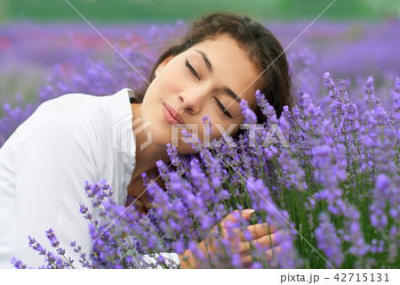 beautiful young woman is in the lavender field beautiful young woman is in the lavender field 42715131