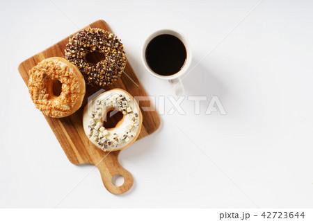 doughnuts with cup of coffee 42723644