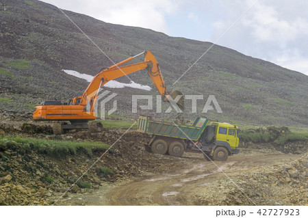 heavy machinery on the construction of roads heavy machinery on the construction of roads 42727923