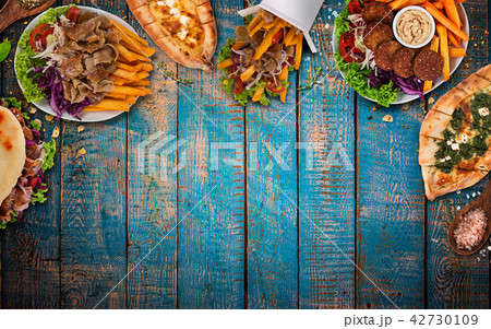 Top down view on traditional turkish meals on vintage wooden table. 42730109