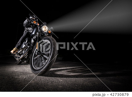 High power motorcycle chopper at night. 42730879