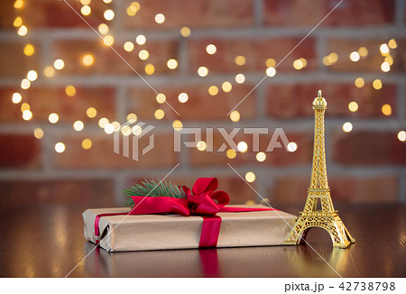gift box with red bow and Eiffel tower souvenir 42738798