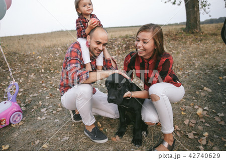 family in a field 42740629